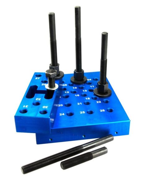 Almohadilla de prensa con pernos espaciadores, ajustable en altura, con placa pequeña y accesorios intercambiables.